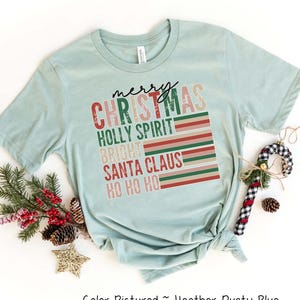 レトロなメリークリスマスシャツ、レディースクリスマスシャツ、レディースホリデーシャツ、クリスマスギフト、信仰のクリスマスシャツ、かわいいホリデーパーティーTシャツ