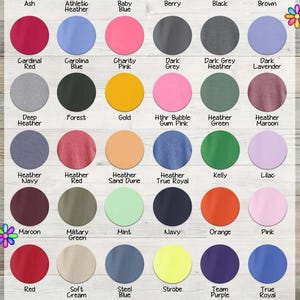 The image is a collage of various colored sweatshirts, each with different styles and designs. The sweatshirts are displayed in a grid format, with each row representing a different color and each column representing a different style or design. The image does not contain any text, and the sweatshirts are not described in detail.