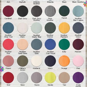 The image is a collage of various colored sweatshirts, each with different patterns and designs. The sweatshirts are arranged in rows and columns, showcasing a range of colors and styles. The image does not contain any text, and the descriptions provided are limited to the colors and patterns of the sweatshirts.