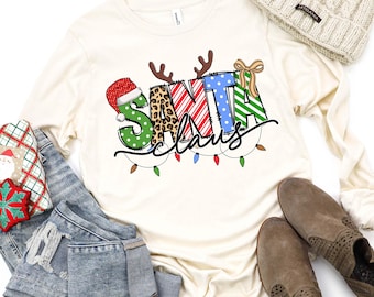 Camiseta navideña de Papá Noel con dibujos, camiseta navideña adorable, camiseta festiva, regalo de Navidad, camiseta navideña a juego para toda la familia, camiseta divertida para fiestas navideñas.