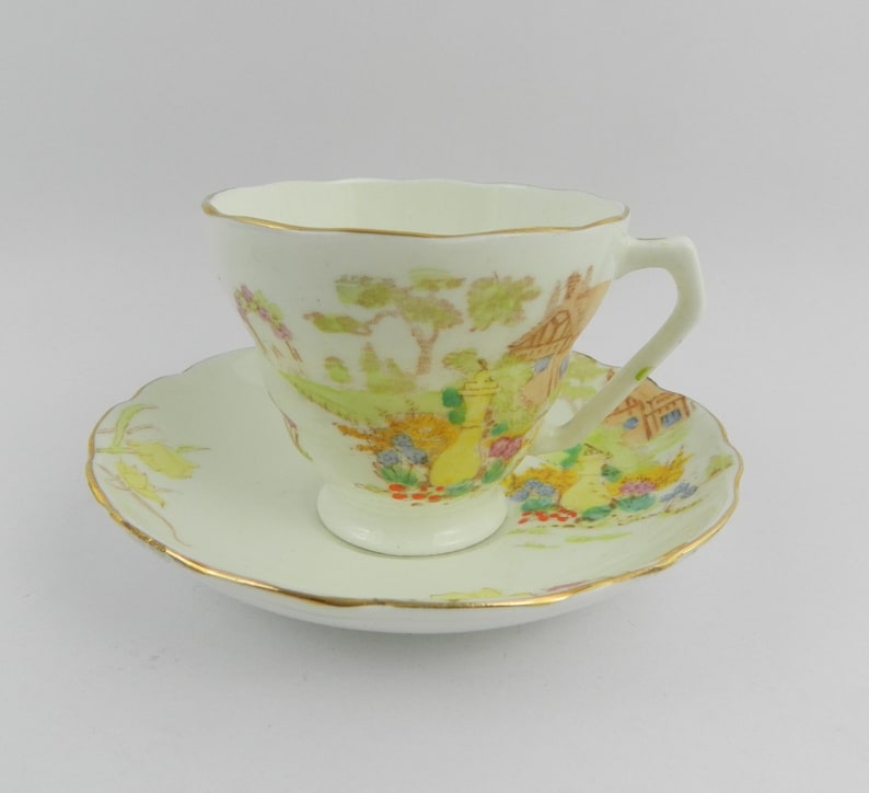 Porcelain coffee tea cup hand painted Fenton Radfords England