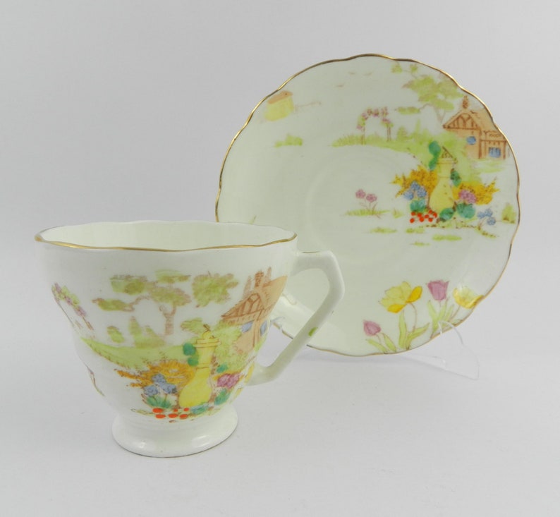 Porcelain coffee tea cup hand painted Fenton Radfords England