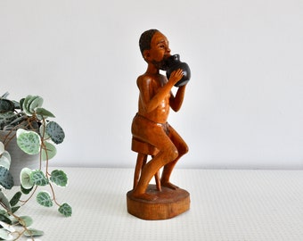 アフリカ／木彫り／木を登る男性たち 歩く男性のヴィンテージアフリカ手彫り木製像 - Etsy 日本
