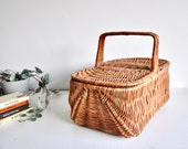 Vintage rattan wicker picnic basket or hamper from the 1970s
