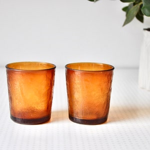 Pair of vintage 1960s amber glass tumblers or drinking glasses