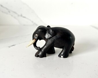 Vintage hand carved wooden elephant figurine or ornament 1970s