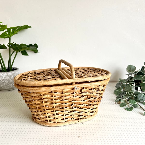 Small vintage rattan wicker hamper basket from the 1970s