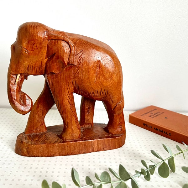 Vintage hand carved wooden elephant figurine or ornament 1970s