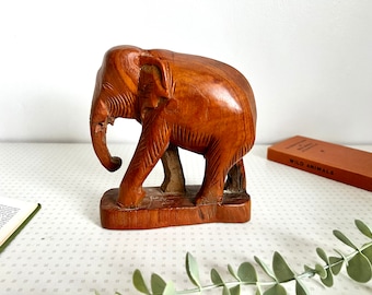 Vintage hand carved wooden elephant figurine or ornament 1970s