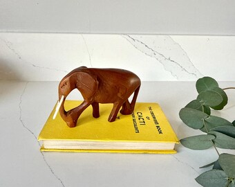 Vintage hand carved wooden elephant figurine or ornament 1970s