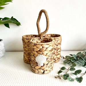 Vintage woven wine basket or holder with shell detail