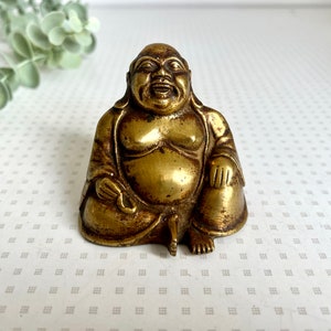 Vintage brass smiling buddha statue or ornament 1950s