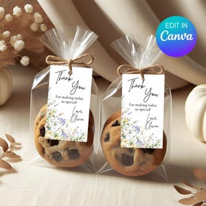 May include: Two clear cellophane bags each containing a chocolate chip cookie and a tag. The tags read "Thank You" with floral accents and the message "For making today so special! Love, Olivia."