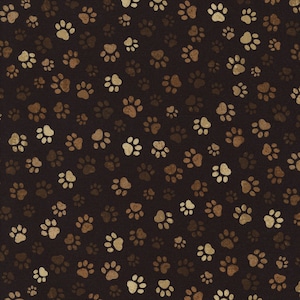 May include: A dark brown fabric featuring a repeating pattern of scattered animal paw prints in varying shades of tan, beige, and light brown. The paw prints are distributed across the surface in a random orientation, creating a textured look.