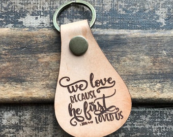 Leather Keyring - "We Love Because He First Loved Us"