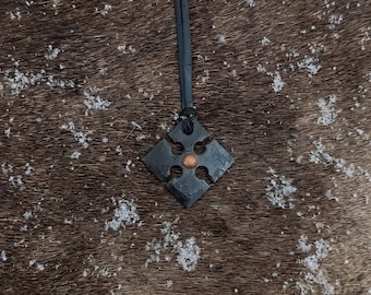 Hand forged Maltese cross, with high quality elk leather string.