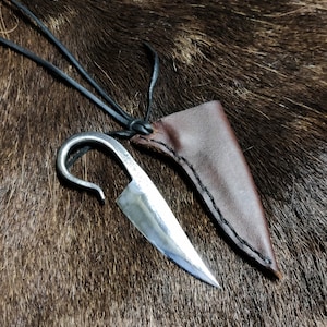 Hand forged small Viking finger knife, with sheath. With high quality elk leather string included for wearing on neck.