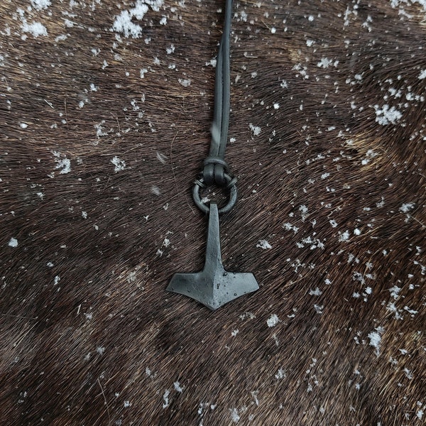 Forged Thor's hammer, with option for a Viking rune. Includes high quality elk leather string.