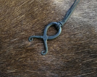 Hand forged Troll's cross, with high quality elk leather thread.