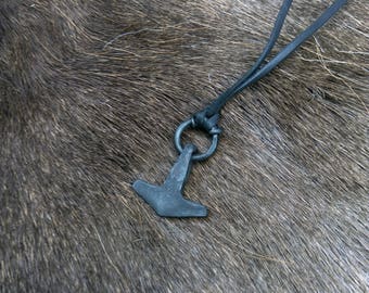 Hand forged Mjölnir, with high quality elk leather string.