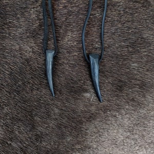 Hand forged wolf's / bear's tooth necklace, with high quality leather string. image 1