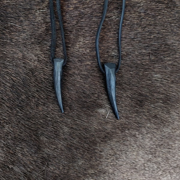 Hand forged wolf's / bear's tooth necklace, with high quality leather string.