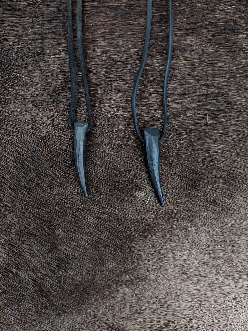 Hand forged wolf's / bear's tooth necklace, with high quality leather string. image 1