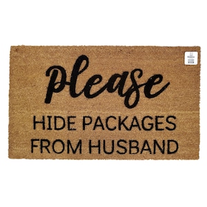 May include: A brown coir doormat with the text "Please hide packages from husband" in black lettering.