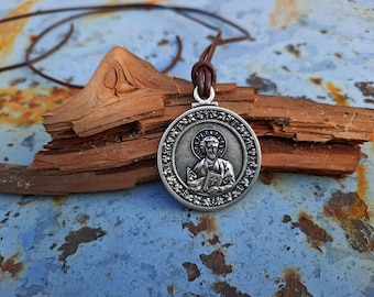 18-Inch Rhodium Plated Necklace with 4mm Emerald Birthstone Beads and Sterling Silver Saint Luke the Apostle Charm. 18-Inch Rhodium Plated Necklace with 4mm Emerald Birthstone Beads and Sterling Silver Saint Luke the Apostle Charm.