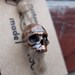 skull bead "Chopped Skull XL". made of bronze. lanyard for knives. paracord.