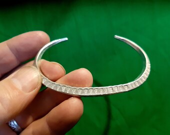 This Viking Ring Money Bracelet (Silver) decorated Skaill style