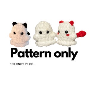 May include: Three crocheted plush toys: a white ghost, a white ghost with black eyes, and a white ghost with red cheeks and a red tail. The text "Pattern only" and "123 Knot It Co." is printed below the toys.
