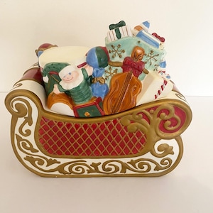 Cookie Jar. Sleigh with toys . Vintage 2003