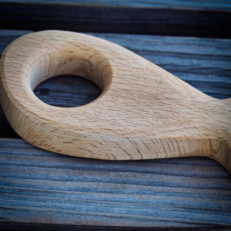 Glass ashtray on handmade wooden pad