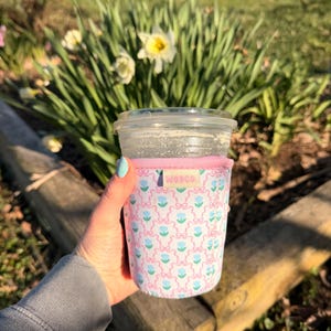 May include: A set of three ceramic mugs with a speckled, matte finish in cream, light grey, and dark grey. Each mug has a simple, modern design and a rounded handle.