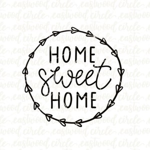 以下が含まれることがあります： 黒い輪郭で描かれたリースのイラスト。リースの中に「HOME sweet HOME」の文字が入っています。