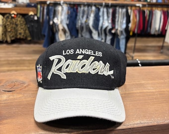 Vintage 90's Los Angeles Raiders Script Spellout Sport Specialties Size 6 7/8