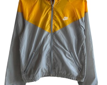 90年代の青と黄色のジップアップウィンドブレーカージャケット - Etsy 日本