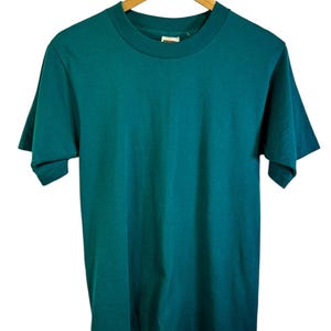 Vintage 90&#39;s Fruit of the Loom Best Blue Blank Tee Size Small