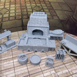 May include: A set of grey plastic miniature buildings for a blacksmith shop, including a forge, anvil, and workbenches.