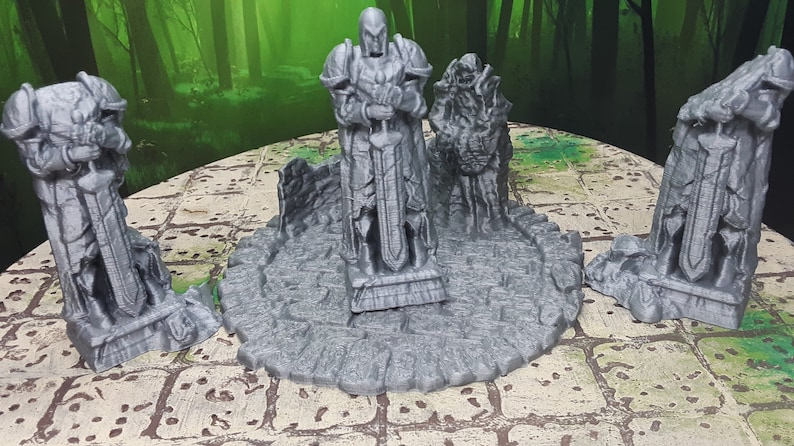 May include: Four gray 3D printed statues of knights, one standing tall with a sword, the other three broken and lying on the ground. The statues are on a circular base with a stone texture.