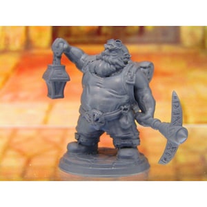 May include: A gray plastic miniature figurine of a dwarf holding a lantern and a pickaxe. The dwarf is wearing a hat with goggles, a vest, and pants. The dwarf is standing on a round base.