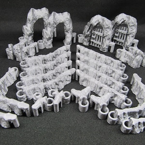 May include: A set of gray 3D printed dungeon walls and gates for tabletop gaming. The set includes a variety of wall sections, arches, and gates, all made in a realistic stone style.