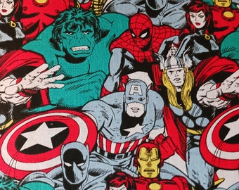 May include: A colorful fabric with a repeating pattern of various Marvel superheroes, including Iron Man, Hulk, Captain America, Spider-Man, and Thor. The fabric features a comic book style design with bold colors and outlines.