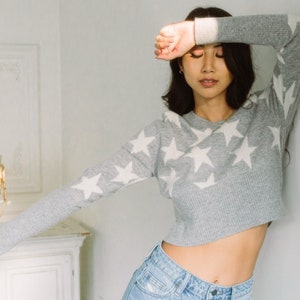 Star cropped sweater hotsell