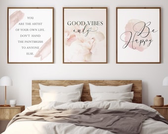 May include: Three framed prints with inspirational quotes and watercolour backgrounds. The first print says "You are the artist of your own life. Don't hand the paintbrush to anyone else." The second print says "Good vibes only." The third print says "Be Happy."
