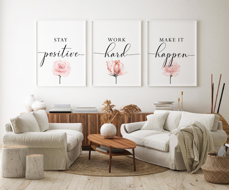 May include: Three motivational prints with watercolor pink roses and black calligraphy. The prints read "Stay positive", "Work hard", and "Make it happen".