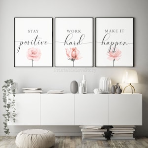 May include: Three framed prints with motivational quotes and watercolor pink roses. The quotes are "Stay positive", "Work hard", and "Make it happen".
