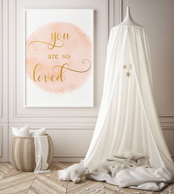 pink and gold nursery decor