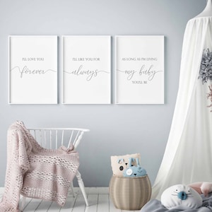 May include: Three white framed prints with black calligraphy text. The first print says "I'll love you forever". The second print says "I'll like you for always". The third print says "As long as I'm living my baby you'll be".